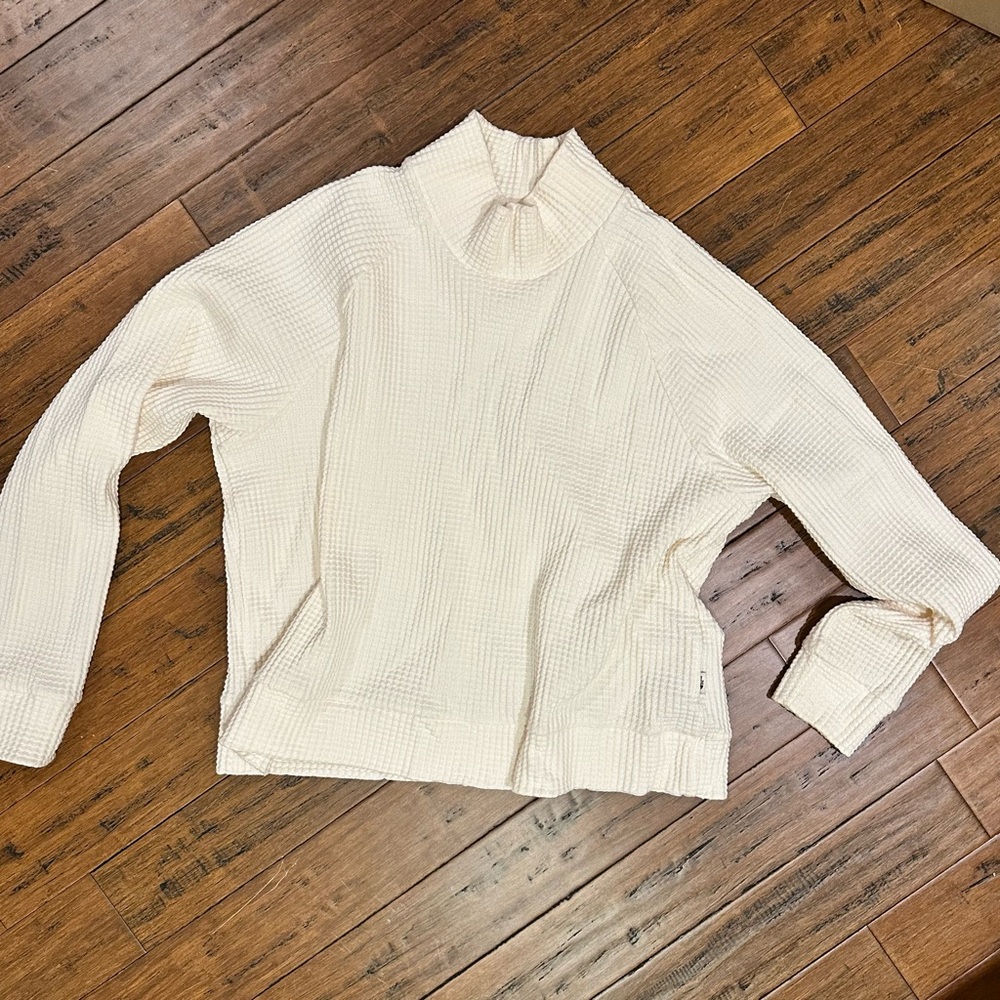 North face cream pull over